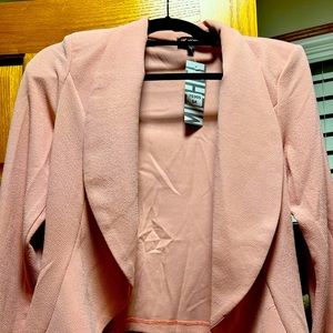 Soft pink blazer size medium long sleeve flare bottom